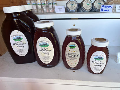 An 8 oz jar of raw wildflower honey. Light honey is made by the bees in early spring while amber honey is made in mid to late summer. Each honey harvest is unique so the flavor may change from jar to jar.&nbsp;